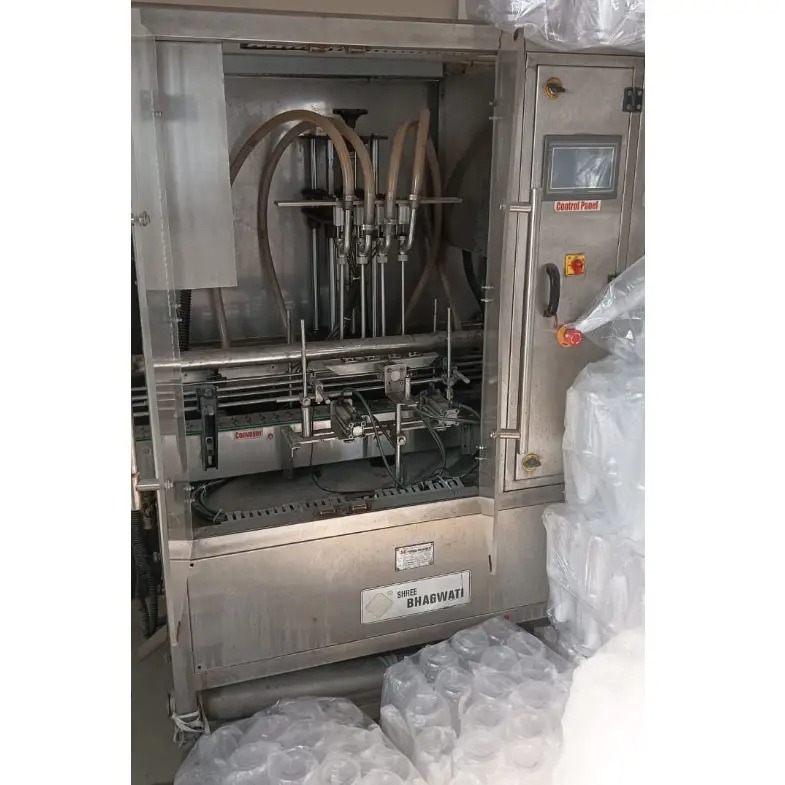 4 Head Automatic Volumetric Liquid Filling Machine